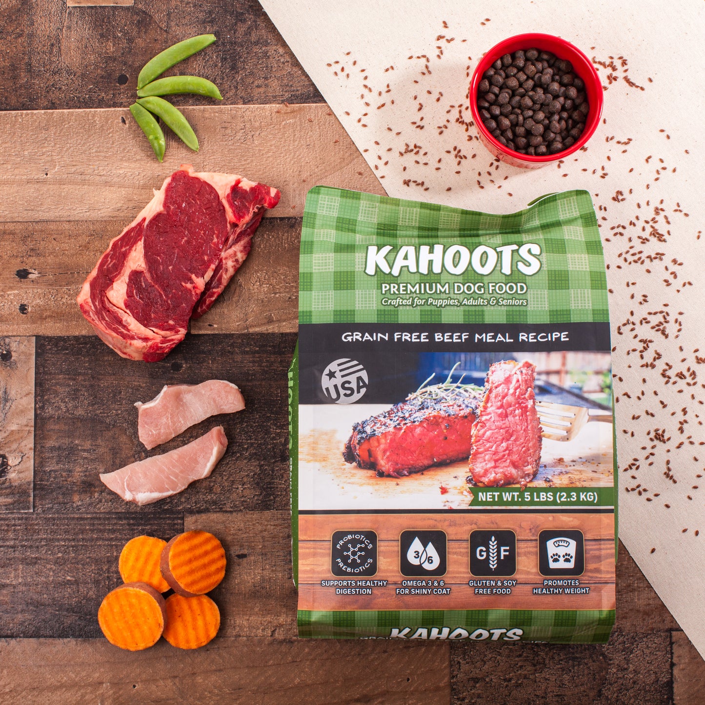 grain free beef dog food over wood background