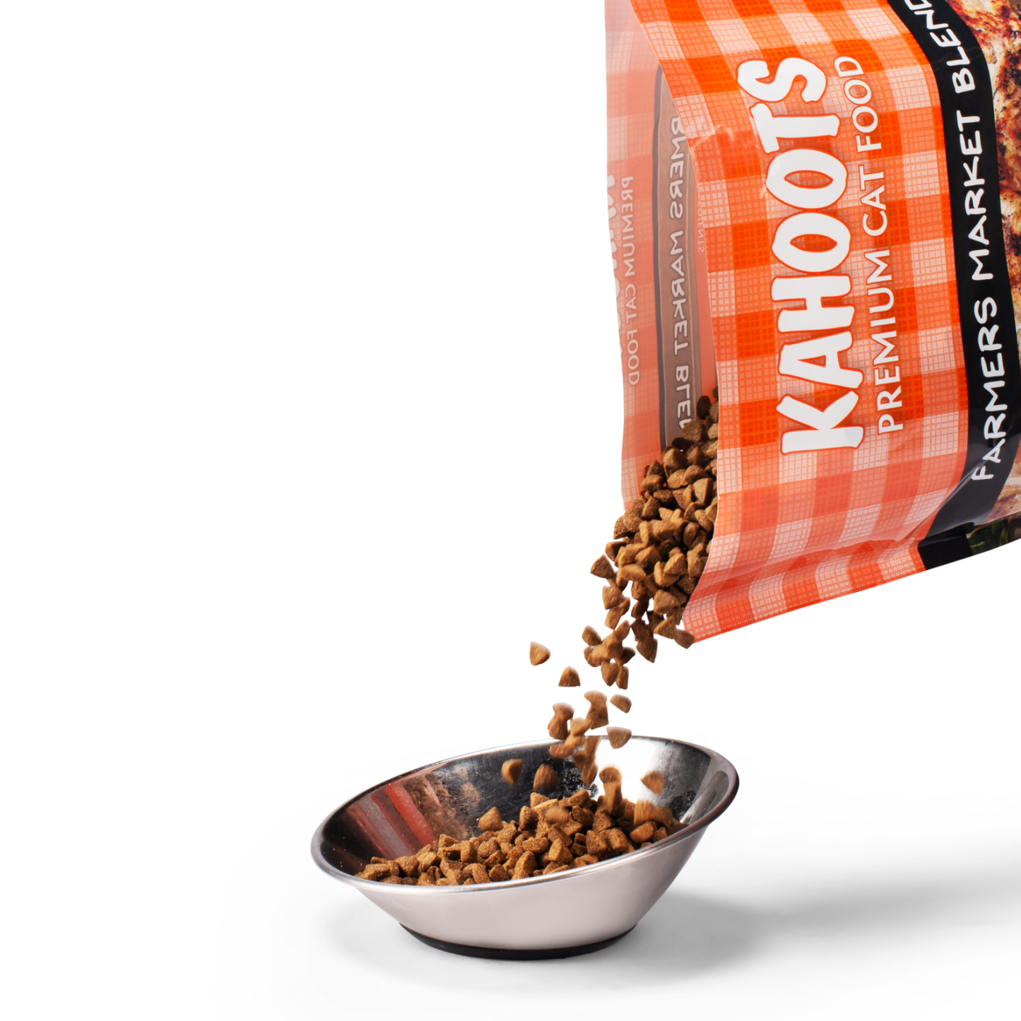 Cat kibble pouring into a bowl and onto the ground