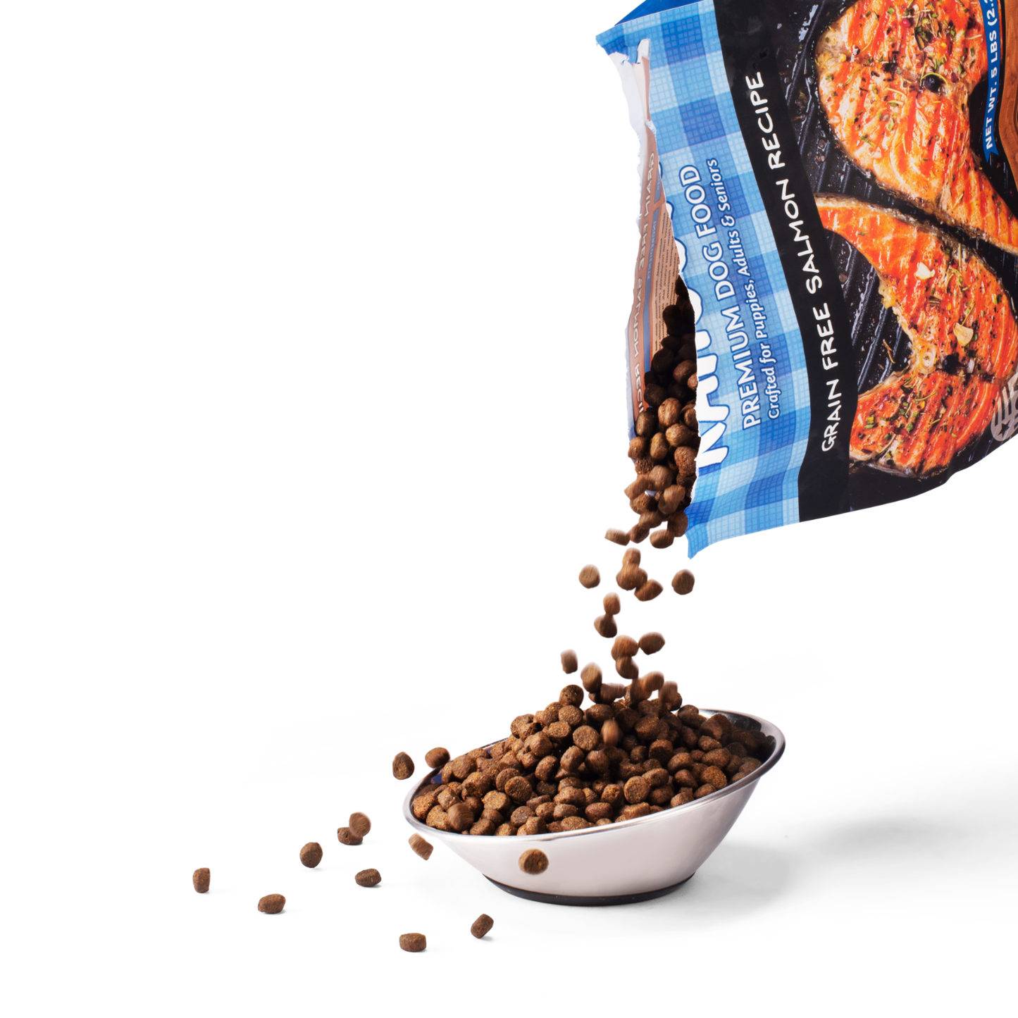 Salmon and sweet potato dog kibble pouring into bowl with kibble spilling out