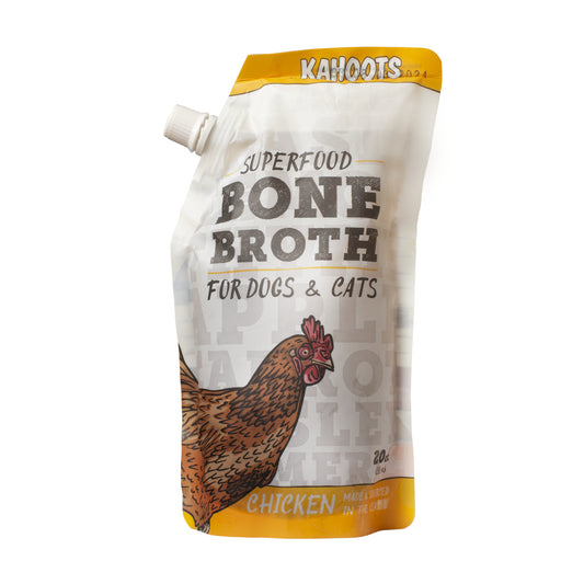 Bone broth packaging, chicken, white packaging with yellow accents and a cartoon chicken 