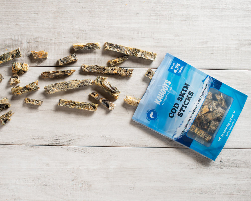 Cod skin mini treats jumping out of packaging like a fish