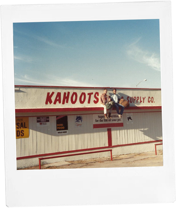 The first Kahoots storefront. Wooden building with red trim.