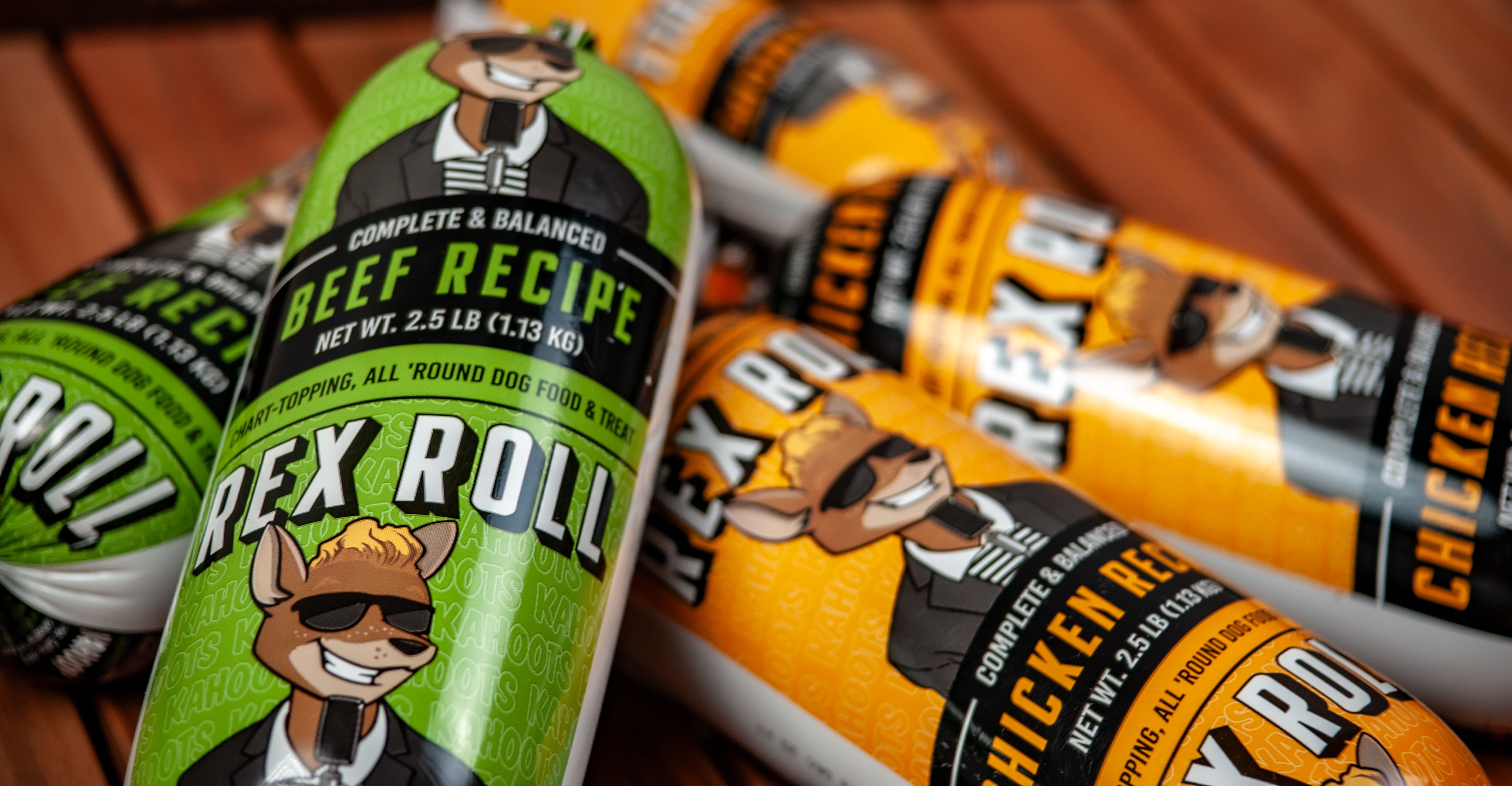 A pile of rex rolls on a wooden table