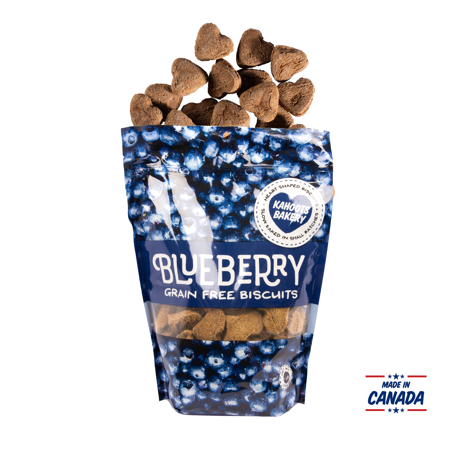 Grain free, heart-shaped blueberry flavored dog biscuits pouring out of bag