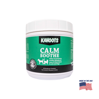 A white plastic tub of Kahoots Calm Soothe pet supplement with a green and black label, shown on a white background with a 'Made in the USA' flag graphic in the bottom right corner.