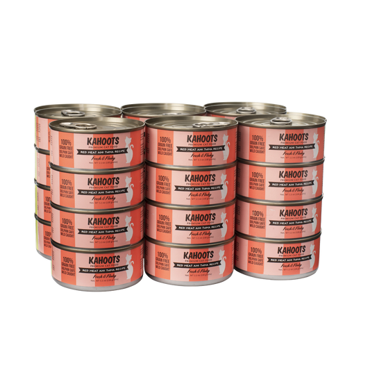 case quantity Red meat ahi tuna wet cat food can. White cat over a cream stripe background