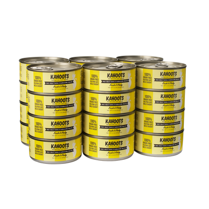 Case quantity of Red meat tuna and albacore wet cat food can. White cat over a yellow stripe background