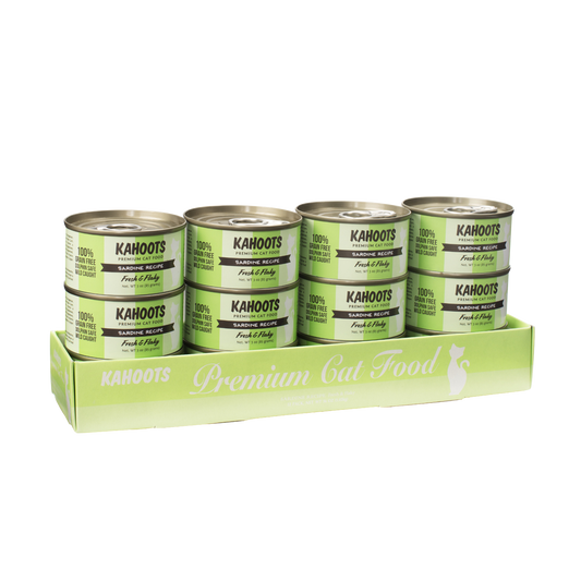 Case quantity of Sardine wet cat food. White cat over green colored striped background on the label