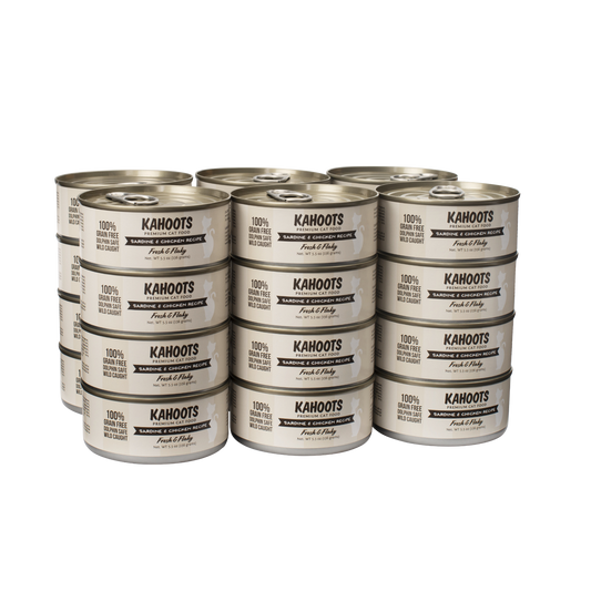 Case quantity of Sardine and Chicken wet cat food. White cat over cream colored striped background on the label