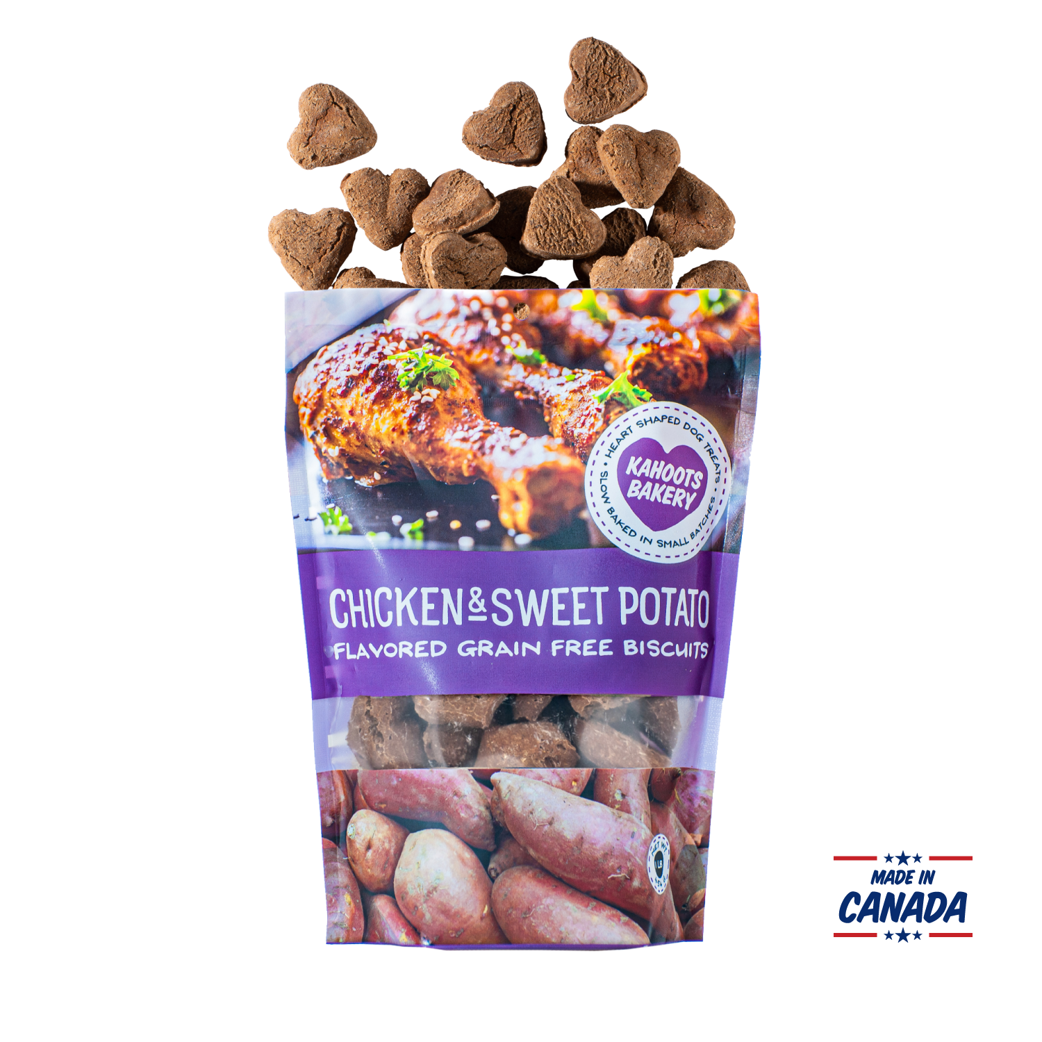 Grain free, heart-shaped chicken and sweet potato flavored dog biscuits pouring out of bag