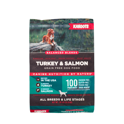 K9 Naturals dog food package with a scenic background