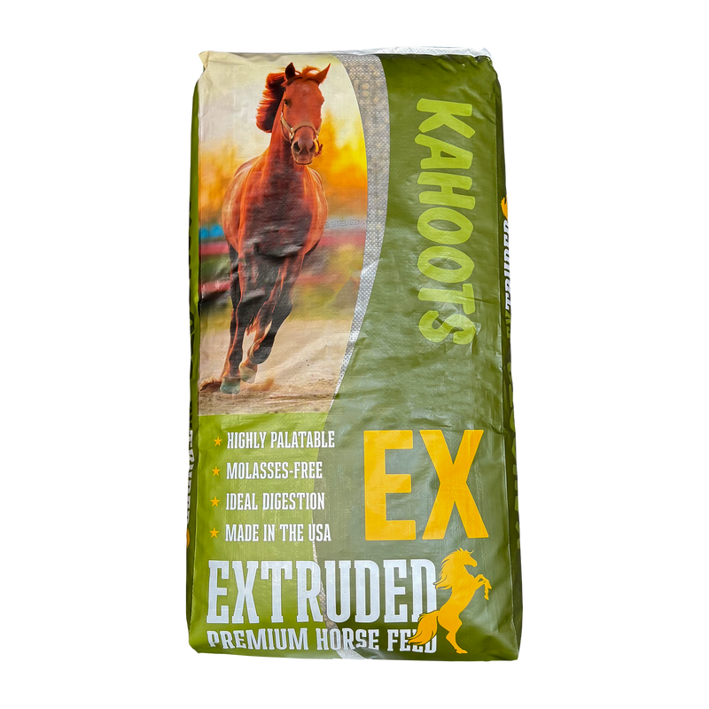 A bag of Kahoots Extruded Premium Horse Feed on a plain white background. The packaging is olive green and yellow, featuring a photo of a brown horse running on the front.