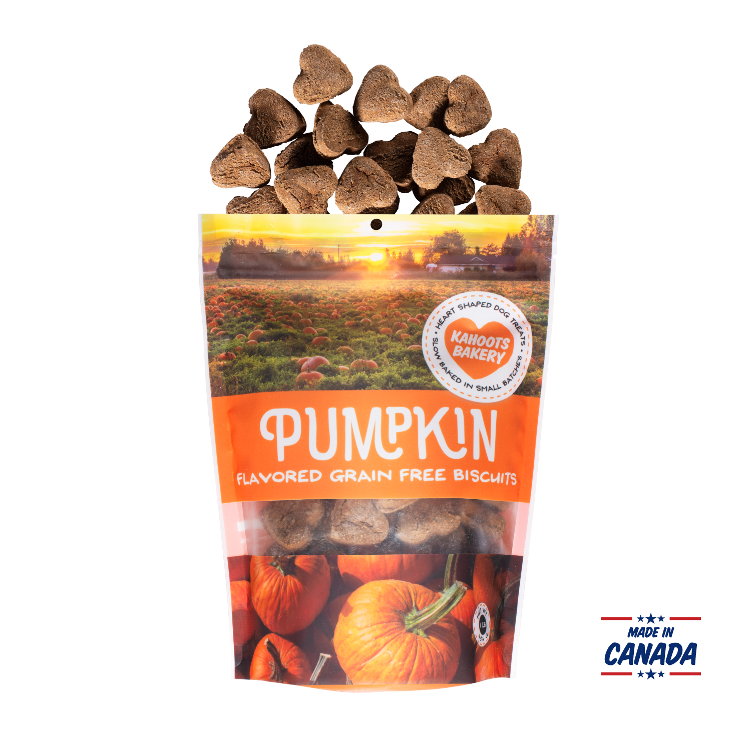 Grain free, heart-shaped pumpkin flavored dog biscuits pouring out of bag