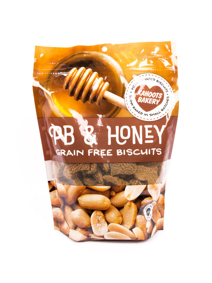 Grain-free Peanut Butter and honey heart-shaped dog biscuits in bag