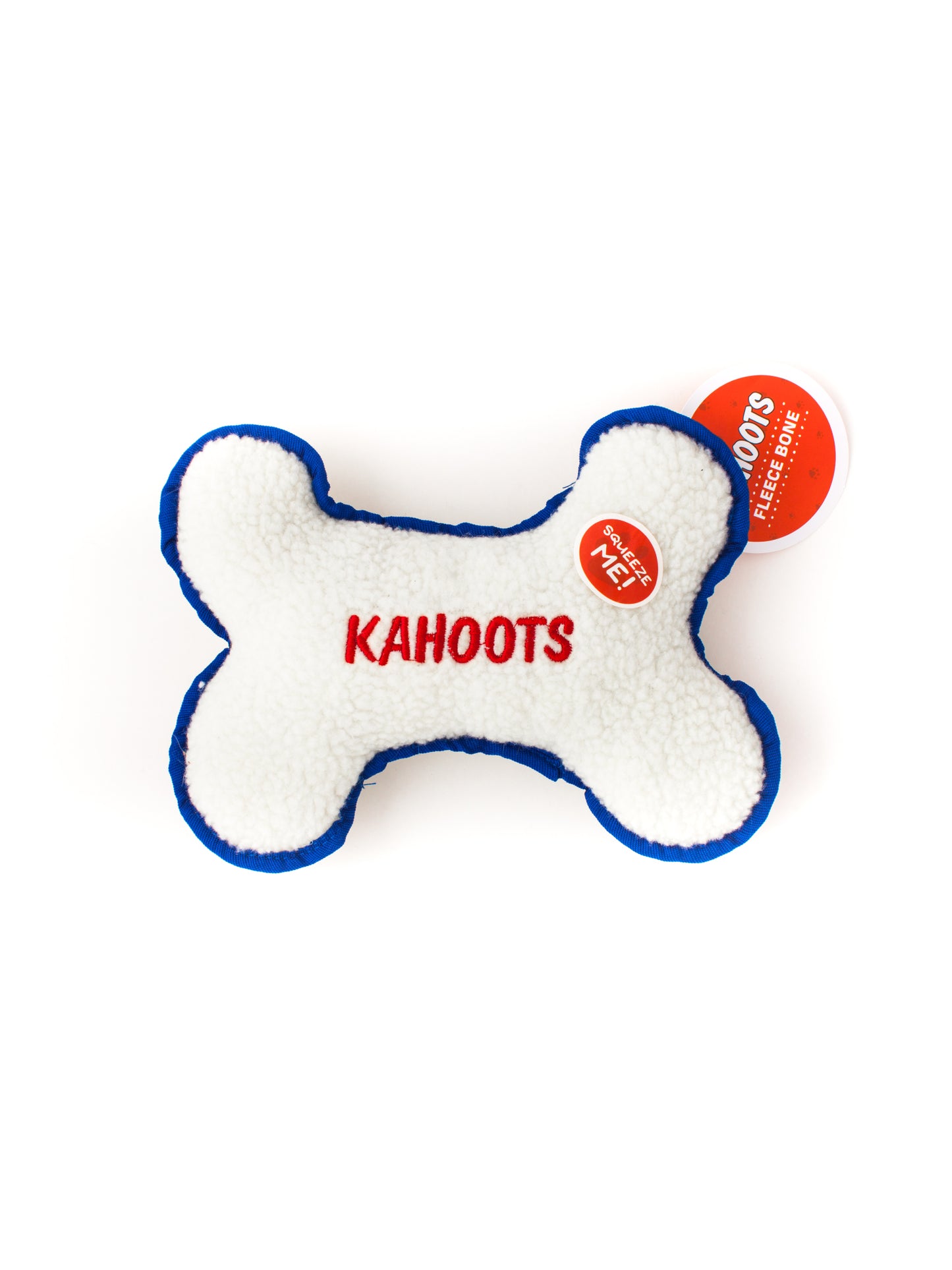 White, fuzzy, plush bone with "Kahoots" embroidered in the middle